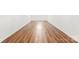 Hallway featuring wood floors that stretch out into the distance at 18733 Bluff Point Rd, Cornelius, NC 28031