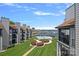 Aerial view of the condo complex with a pool at 18853 Vineyard Point Ln, Cornelius, NC 28031