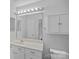 Bathroom with a mirrored medicine cabinet and vanity at 18853 Vineyard Point Ln, Cornelius, NC 28031