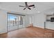 Bright living room with wood floors, balcony access and a scenic view of the marina at 18853 Vineyard Point Ln, Cornelius, NC 28031