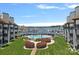 Exterior view of a refreshing pool and marina view, nestled between the condominiums at 18853 Vineyard Point Ln, Cornelius, NC 28031