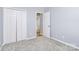 Bedroom features a closet, plush carpeting, and neutral paint at 1922 Decatur Ct, Charlotte, NC 28213