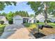 Beautiful home with a manicured lawn and a driveway leading to an attached one car garage at 1922 Decatur Ct, Charlotte, NC 28213