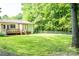 Spacious backyard with a patio, ideal for outdoor entertaining and relaxation at 214 Cottage Pl, York, SC 29745