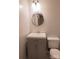 Bathroom featuring a vanity with gray cabinets and a round mirror at 214 Cottage Pl, York, SC 29745