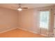 Bedroom featuring a ceiling fan, natural light, and hardwood flooring at 214 Cottage Pl, York, SC 29745