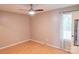 Bedroom featuring a ceiling fan, natural light, and hardwood flooring at 214 Cottage Pl, York, SC 29745