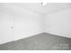 Bright bedroom with soft carpet, white walls, and a closet door at 219 Redondo Dr # 65, Wingate, NC 28174