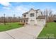 Beautiful exterior view of a two story house with two car garage and modern curb appeal at 219 Redondo Dr # 65, Wingate, NC 28174