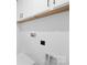 Bright laundry area featuring white cabinets and an area for a washer and dryer at 219 Redondo Dr # 65, Wingate, NC 28174