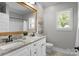 Bathroom featuring double sink vanity with granite countertops, modern fixtures and large mirror at 2341 Shiny Leaf Dr, Denver, NC 28037