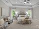 Bright bedroom with tray ceiling, natural light, stylish furniture and decor at 2341 Shiny Leaf Dr, Denver, NC 28037