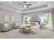 Bright bedroom with tray ceiling, natural light, stylish furniture and decor at 2341 Shiny Leaf Dr, Denver, NC 28037