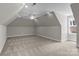 Spacious carpeted bonus room with a ceiling fan, recessed lights, and dormer windows at 2341 Shiny Leaf Dr, Denver, NC 28037
