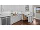 Bright kitchen area with white cabinets, stainless steel appliances, and workspace area at 2341 Shiny Leaf Dr, Denver, NC 28037