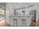 Open kitchen with granite countertops, breakfast bar and stainless steel appliances at 2341 Shiny Leaf Dr, Denver, NC 28037