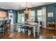 Sunlit dining area with stylish furnishings, chandelier, and convenient access to the kitchen at 261 Catoctin Rd, Rock Hill, SC 29732
