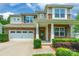 Charming two-story home with brick accents, and a two-car garage and front door at 261 Catoctin Rd, Rock Hill, SC 29732