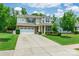 Charming two-story home with well-manicured lawn, brick accents, and a two-car garage at 261 Catoctin Rd, Rock Hill, SC 29732