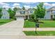 Charming two-story home with well-manicured lawn, brick accents, and a two-car garage at 261 Catoctin Rd, Rock Hill, SC 29732