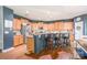 Eat-in kitchen with stainless steel appliances, wooden cabinets, and breakfast bar with seating at 261 Catoctin Rd, Rock Hill, SC 29732