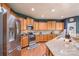 Well-appointed kitchen featuring stainless steel appliances, ample counter space, and wooden cabinets at 261 Catoctin Rd, Rock Hill, SC 29732