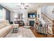 Cozy living room with a fireplace, hardwood floors, and comfortable seating at 261 Catoctin Rd, Rock Hill, SC 29732