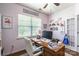 Bright office space with custom shelves, a large desk, and abundant natural light at 261 Catoctin Rd, Rock Hill, SC 29732