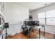 Bright office space with custom shelves, a large desk, and abundant natural light at 261 Catoctin Rd, Rock Hill, SC 29732