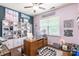 Bright office space with custom shelves, a large desk, and abundant natural light at 261 Catoctin Rd, Rock Hill, SC 29732