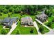 Expansive estate featuring pristine landscaping, a pool, and a grand home with a long driveway and ample parking at 300 Wheatberry Hill Dr, Weddington, NC 28104