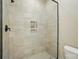 Walk-in shower with glass door and tile surround at 300 Wheatberry Hill Dr, Weddington, NC 28104