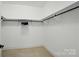 Walk-in closet with hanging racks and shelving at 300 Wheatberry Hill Dr, Weddington, NC 28104