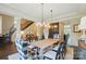 Spacious dining room with hardwood floors and ample natural light, ideal for Gathering dinners and entertaining guests at 300 Wheatberry Hill Dr, Weddington, NC 28104