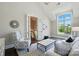 Comfortable living room with large window and stylish furnishings, perfect for relaxing at 300 Wheatberry Hill Dr, Weddington, NC 28104
