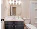Bathroom showcasing a modern vanity, mirror, and convenient toilet area at 3043 Charles Rd, Shelby, NC 28152
