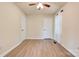 Spacious bedroom featuring natural light, neutral paint, and updated vinyl floors at 3043 Charles Rd, Shelby, NC 28152