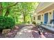 Charming home exterior with a well-maintained front yard, a blue door, and a curving walkway at 3043 Charles Rd, Shelby, NC 28152