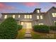 Exterior backyard view, featuring a green lawn and a stone pathway at 3153 Bending Birch Pl, Charlotte, NC 28206