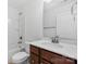 Bathroom features a sink with dark cabinets and a shower/tub combination at 3153 Bending Birch Pl, Charlotte, NC 28206