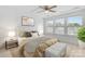 Inviting bedroom featuring a comfortable bed, neutral tones, and plenty of natural light at 3153 Bending Birch Pl, Charlotte, NC 28206
