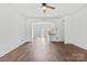 Spacious living room with hardwood floors and an open floor plan at 3153 Bending Birch Pl, Charlotte, NC 28206