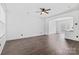 Open-concept living room with hardwood floors that flow into the kitchen at 3153 Bending Birch Pl, Charlotte, NC 28206