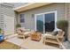 Cozy outdoor patio with comfortable seating, perfect for relaxing or entertaining at 3153 Bending Birch Pl, Charlotte, NC 28206