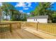 New wooden deck provides a great space for relaxing or grilling in the backyard at 338 Hollingswood Dr, Statesville, NC 28625
