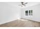 This bedroom features natural light, and new flooring at 338 Hollingswood Dr, Statesville, NC 28625