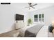 This bedroom features a flat screen tv, new furniture, and natural light at 338 Hollingswood Dr, Statesville, NC 28625