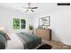 This bedroom features a plant, furniture, and natural light at 338 Hollingswood Dr, Statesville, NC 28625