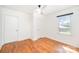 Bedroom with hardwood floors, a ceiling fan, and a window with a view at 3595 Mt Holly Rd, Edgemoor, SC 29712