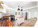 Bright kitchen featuring butcher block countertops, a stainless steel refrigerator, and hardwood style floors at 3595 Mt Holly Rd, Edgemoor, SC 29712